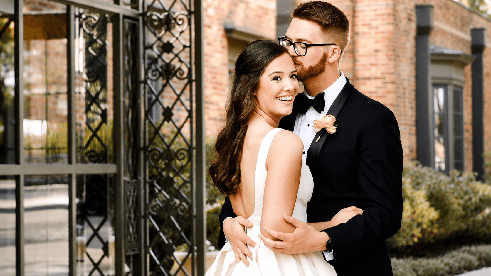 Wedding couple at a classic venue — intimate, quiet, classy